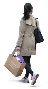 woman with a shopping bag walking