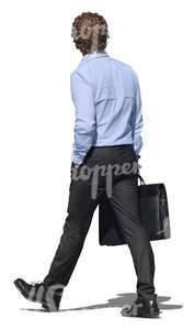 cut out businessman walking with a briefcase in his hand