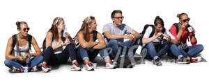 six people sitting in a row and eating snacks