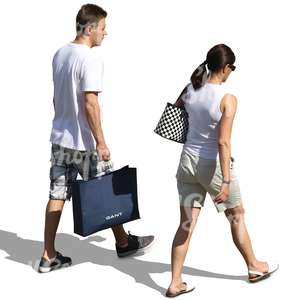 man and woman in light summer clothing walking