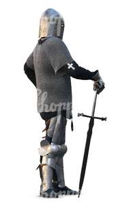cut out street artist dressed as a medieval knight