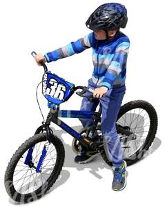 boy with a helmet riding a bike