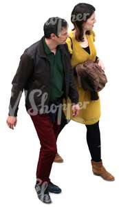 man and woman walking and looking at something