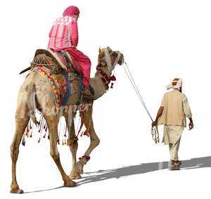 man steering a camel with a woman riding on it