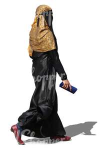 muslim woman wearing a hijab walking 