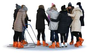 group of women skating in the ice rink