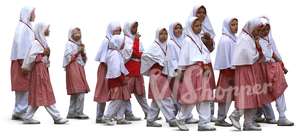 group of muslim schoolgirls walking in a row
