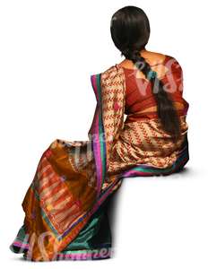 indian woman wearing a sari sitting