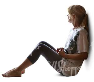 woman sitting on a window sill