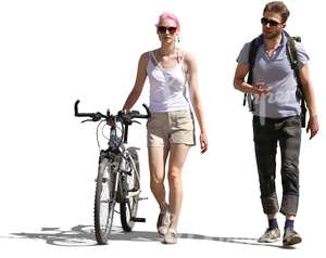 man walking with a woman who has a bike