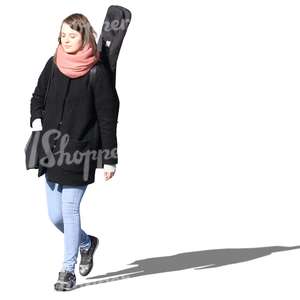 woman with a musical instrument walking