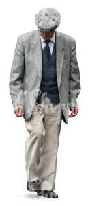 elderly man in an elegant grey suit walking