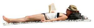 woman sunbathing and reading a book