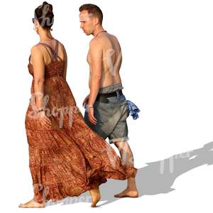 couple walking barefoot on the beach