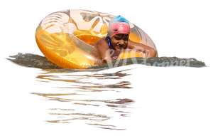 boy swimming with a yellow floatie