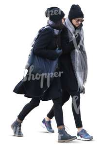 two women with large grey scarves walking side by side