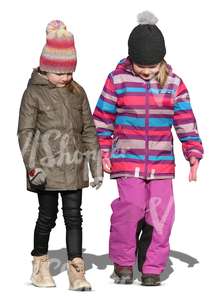 two young girls walking in autumn