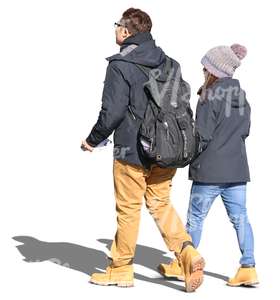 asian couple walking hand in hand in the autumn sun