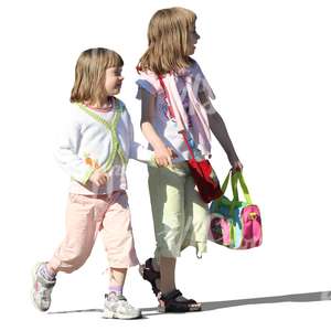 two little girls walking hand in hand