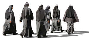 group of nuns walking on the street