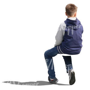 blond boy sitting seen from behind