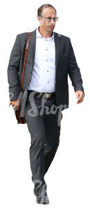 businessman with headphones walking