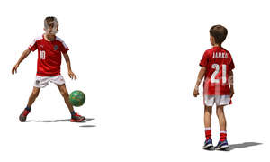 two young boys playing football