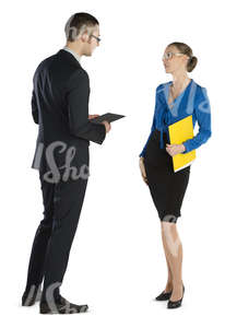 businessman and businesswoman standing and talking