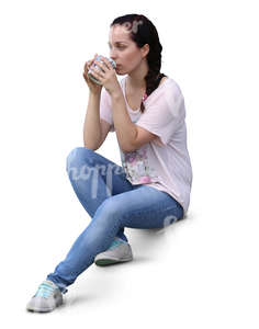 woman sitting on the stairs and drinking coffee