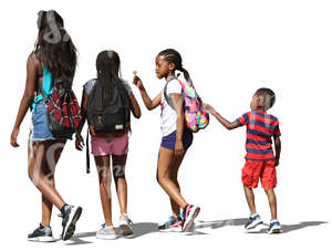 four black children at different ages walking side by side