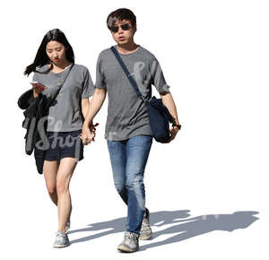 asian couple walking hand in hand