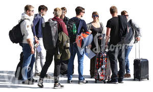 group of young people with suitcases standing together