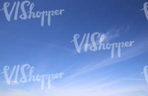 blue sky with thin cloud stripes