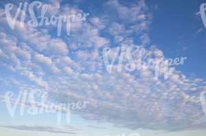 daytime sky with many fluffy clouds