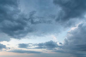 evening sky with deep blue clouds