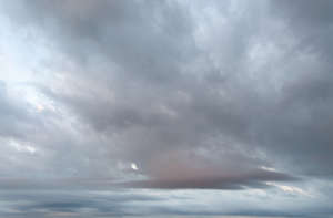 daytime sky with light grey clouds