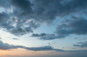 sunrise with dark blue clouds