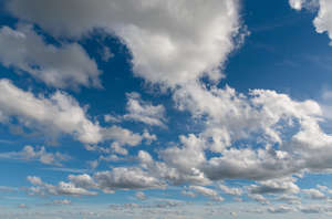 blue sky with many cumulus clouds