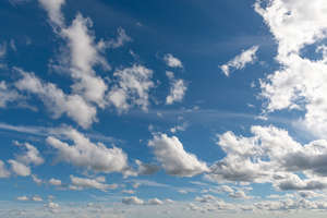 daytime sky with bright white clouds