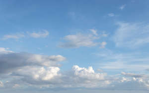 pale blue daytime sky with clouds