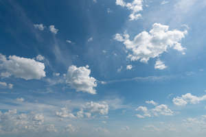 daytime sky with scattered clouds