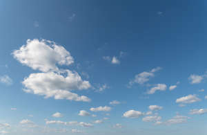 sky with few fluffy clouds