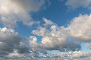 daytime sky with many big clouds