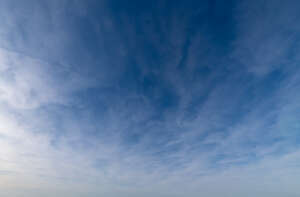 daytime sky with thin cover of clouds