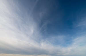 sky with a thin layer of clouds