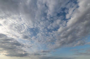 daytime sky with densely scattered clouds