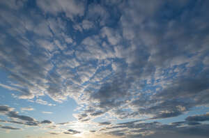 evening sky with layer of scattered clouds