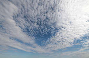 sky with densely scattered white clouds