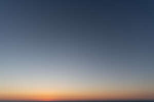 clear sunset with sun behind the horizon