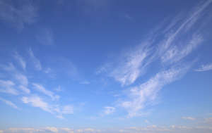 bright blue sky with few clouds